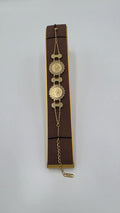 Gold coin tennis bracelet